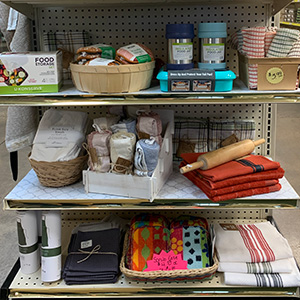 Kitchen towels, scrubbies, food storage containers, aprons, insulated containers